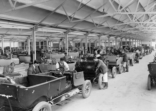 This shot shows the body mounting shop at Morris Motors in Oxford, in 1925