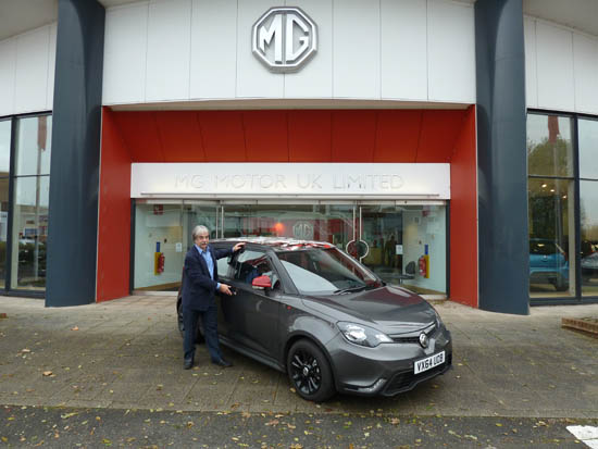 Kim Henson visited MG’s home at Longbridge, Birmingham for ‘Wheels-Alive’, and test-drove a prototype of the firm’s new ‘Electric Vehicle Concept’ car. He is seen here with a new MG3