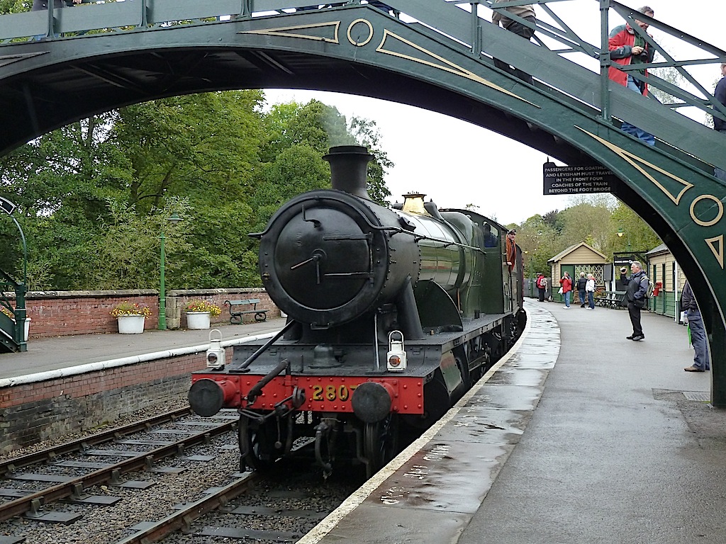 Heavy Freight locomotive 2807 arrives in the rain at Pickering station on the North Yorkshire Moors Railway. This ex Great Western loco dates from 1914 and is the oldest surviving standard class engine (the standard class steam locos were introduced by George Jackson Gloucster).
