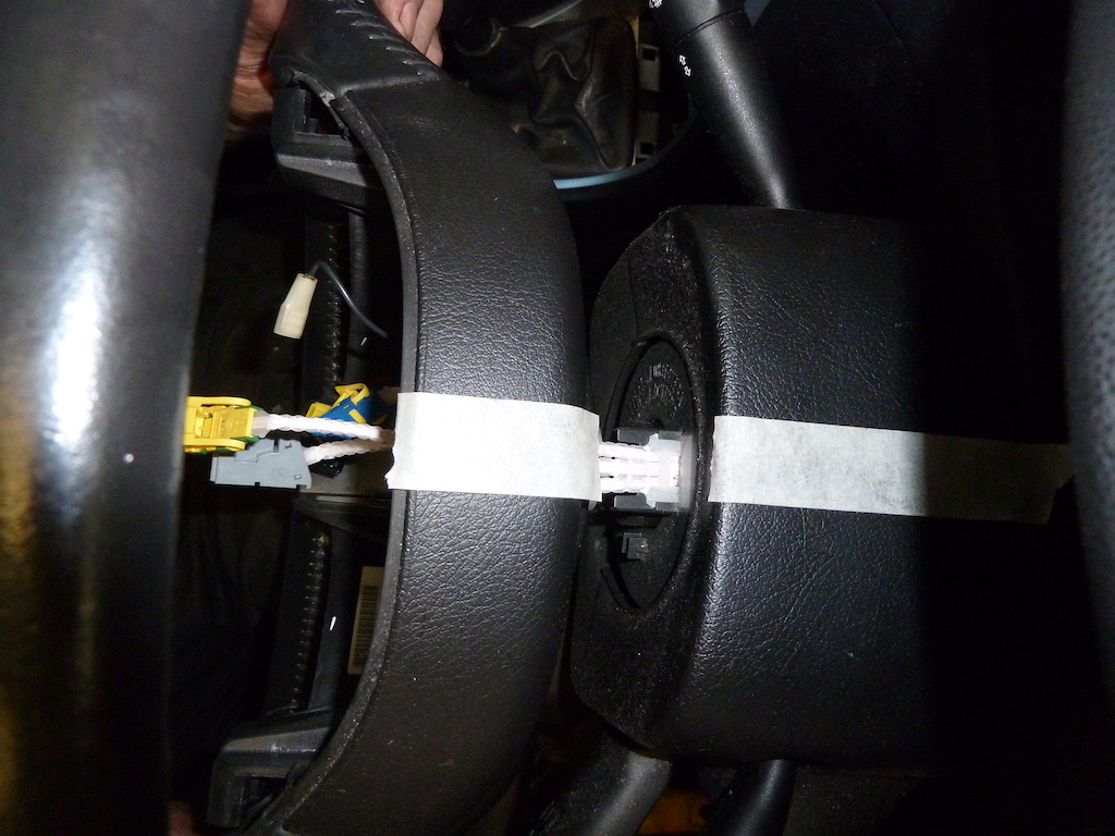 Masking tape can be used to mark the position of the steering wheel, prior to removal.