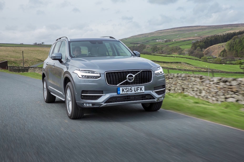 Front, dynamic image of the all-new Volvo XC90 in Osmium Grey